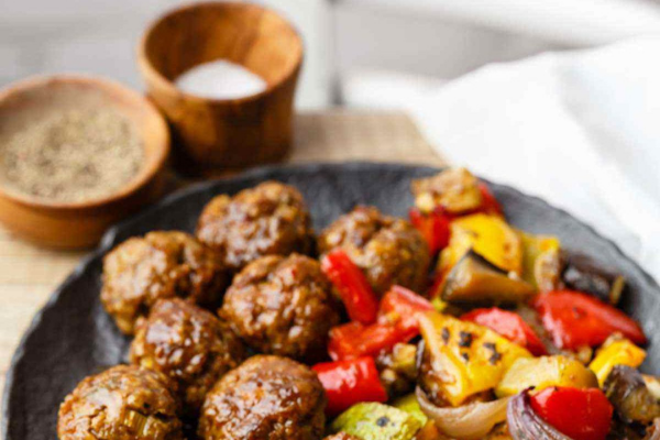 Meatballs in a cast iron skillet.